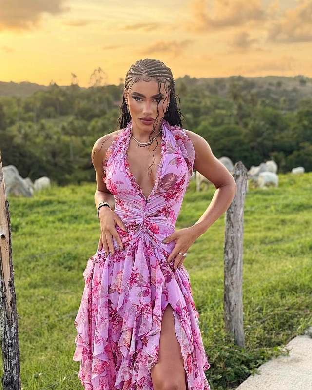 scene: Halter Floral Maxi Dress in Deep pink styled in a real-life setting