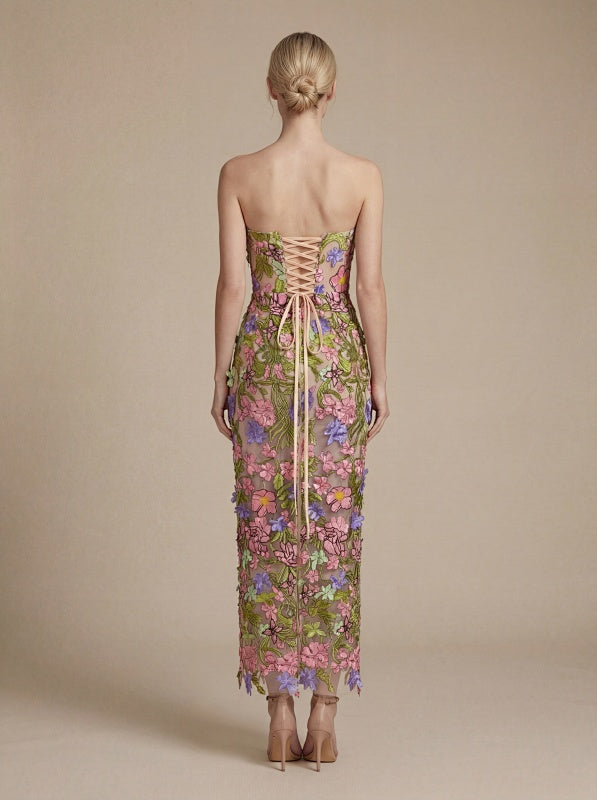 model: Model wearing Floral Strapless Midi Dress