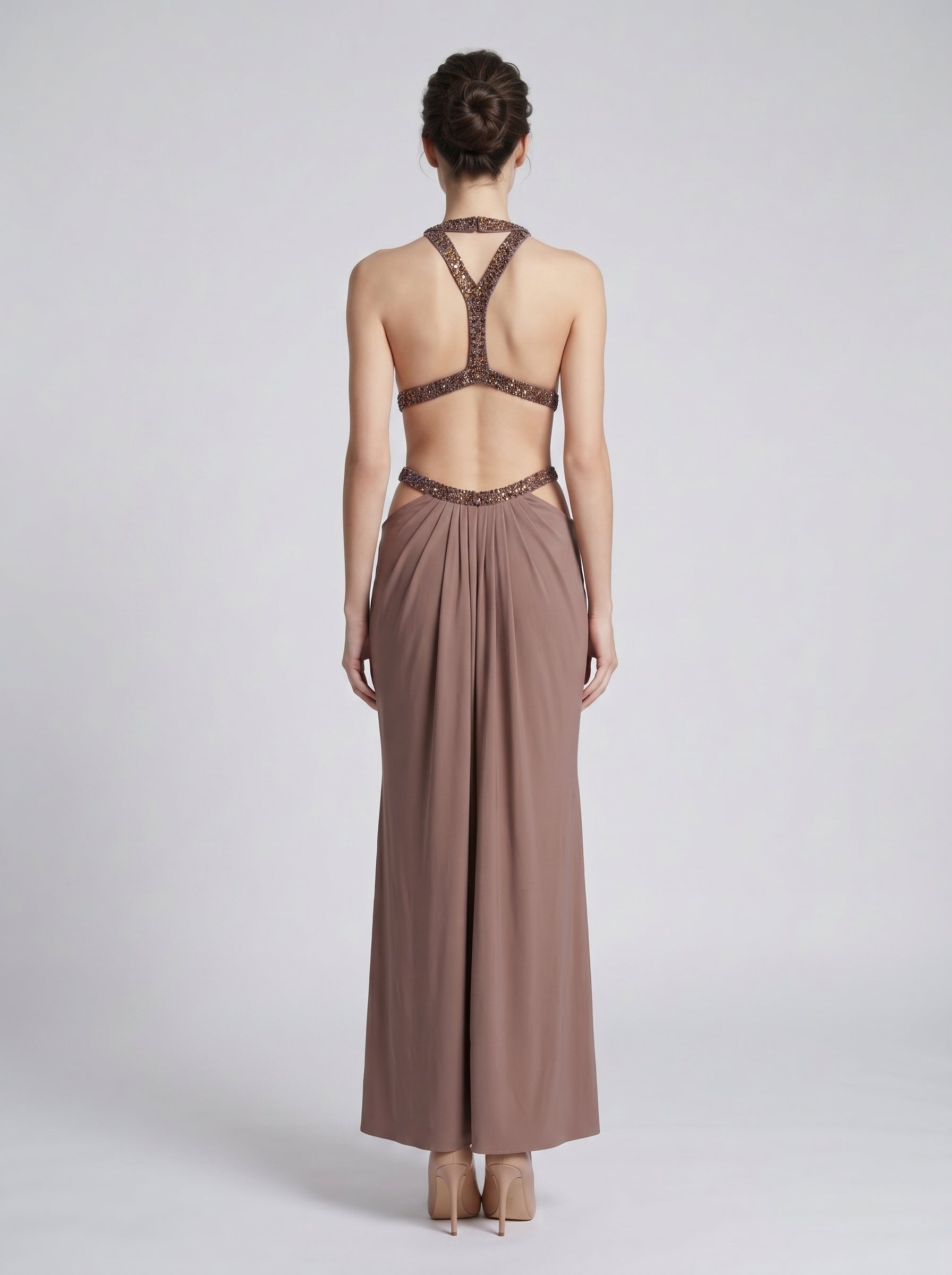 model: Model wearing Maillard Rhinestone Cutout Gown In Brown