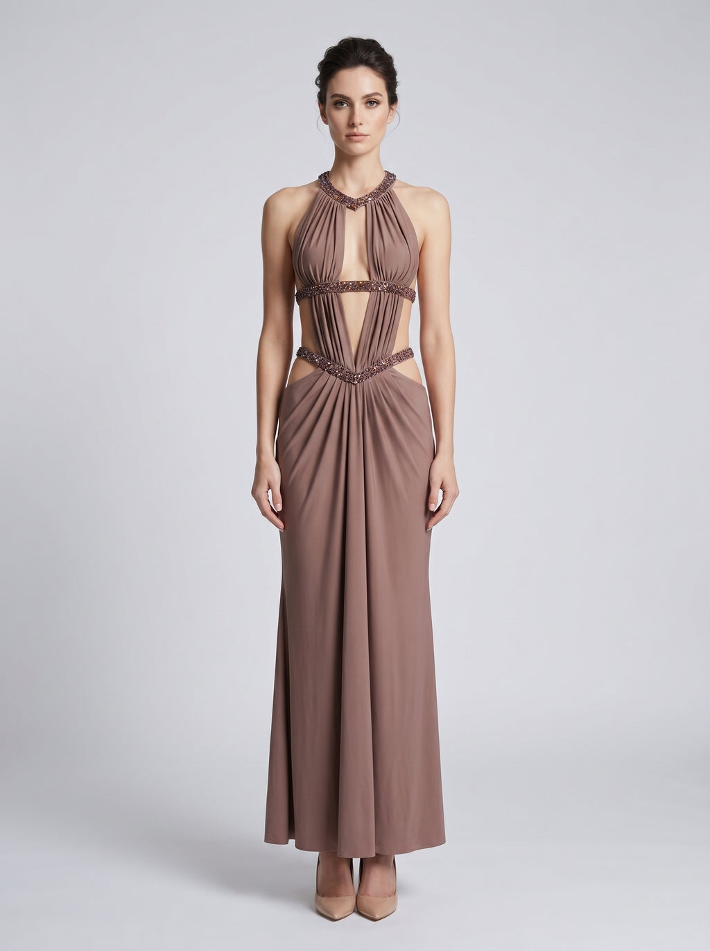 model: Model wearing Maillard Rhinestone Cutout Gown In Brown
