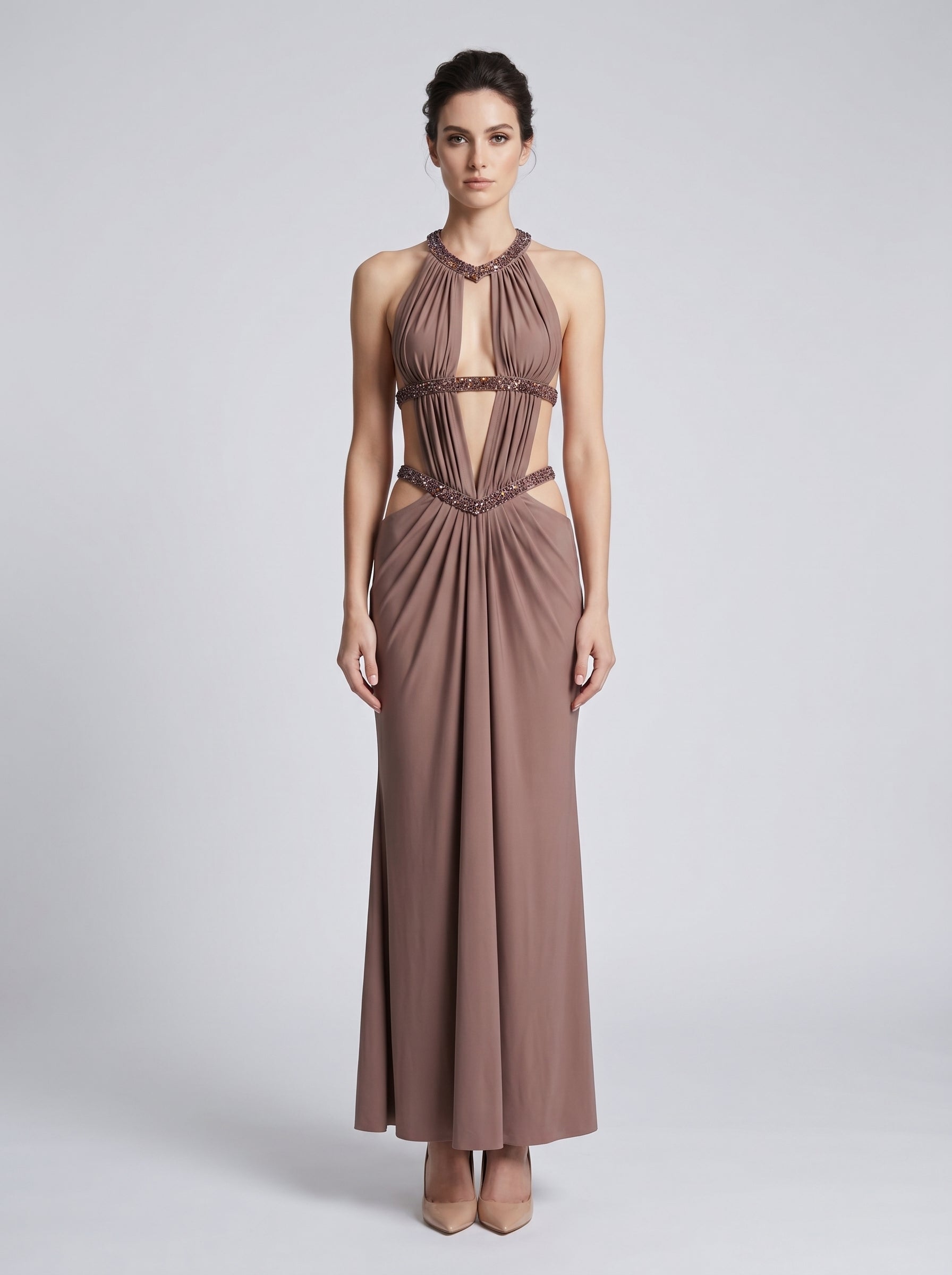 model: Model wearing Maillard Rhinestone Cutout Gown In Brown